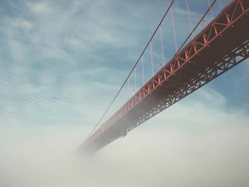 bridge photography of red crane bridge mist